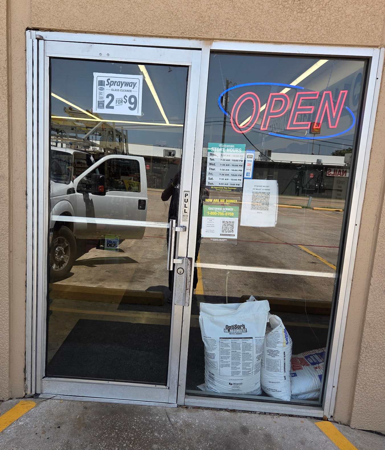 Storefront door pair after replacement of the broken glass.
